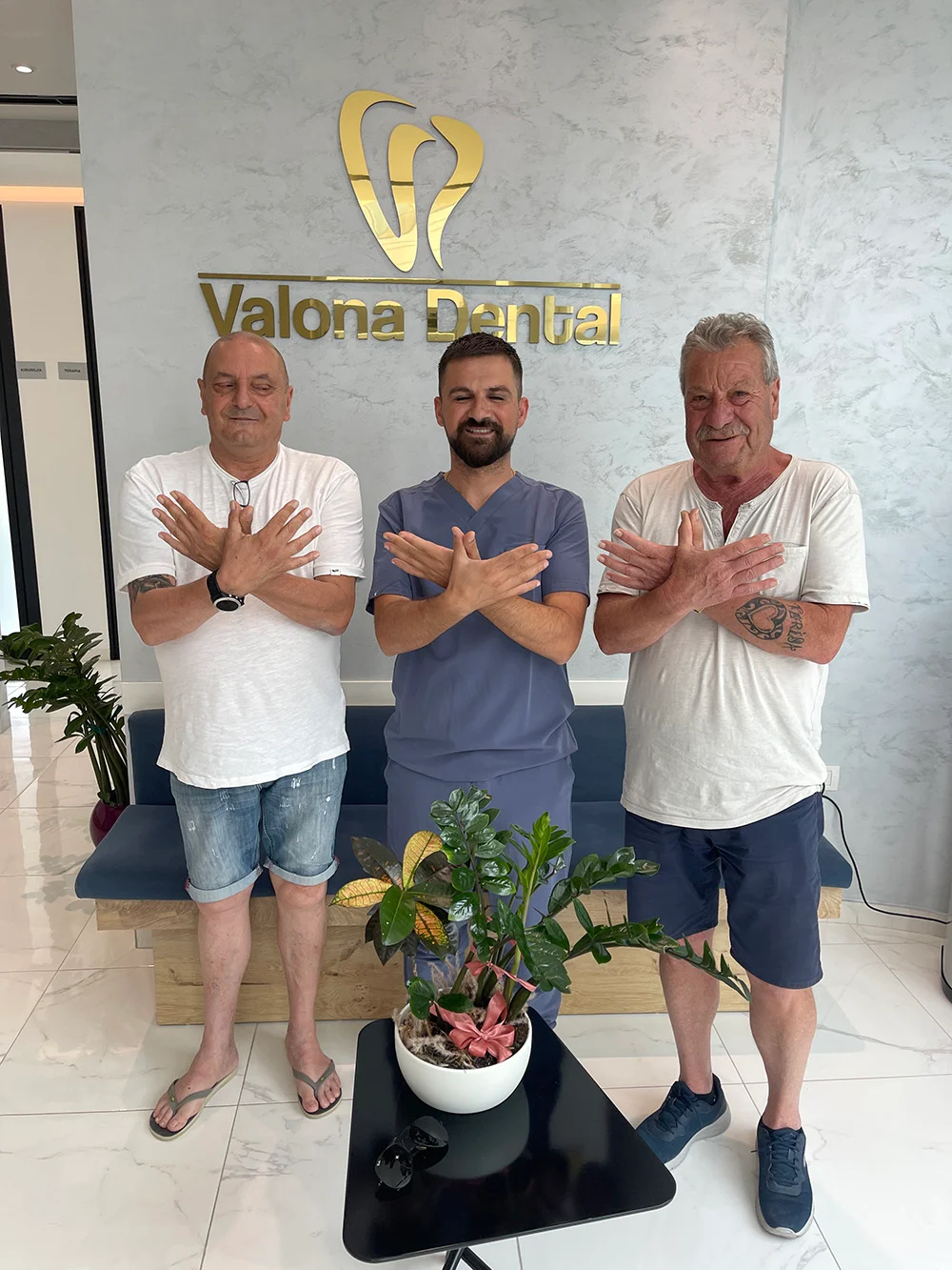 Patients with doctor at Valona Dental